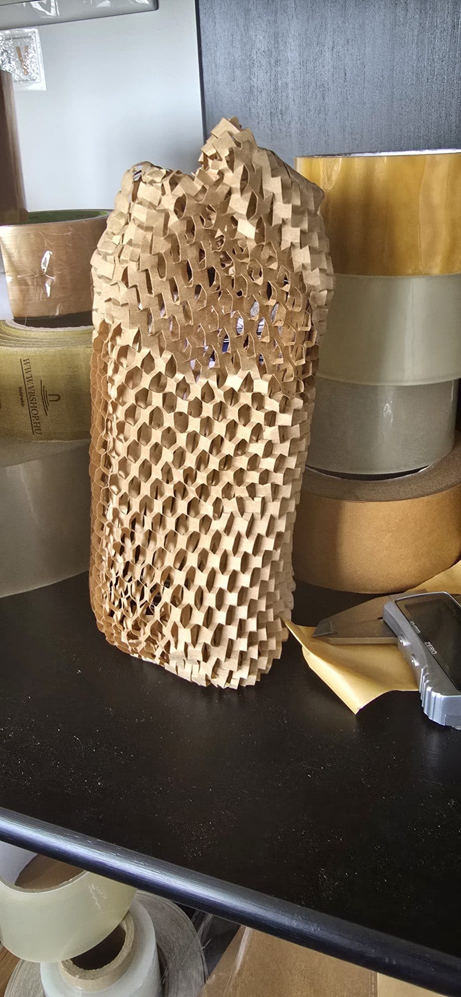 Honeycomb paper wrap protecting a product