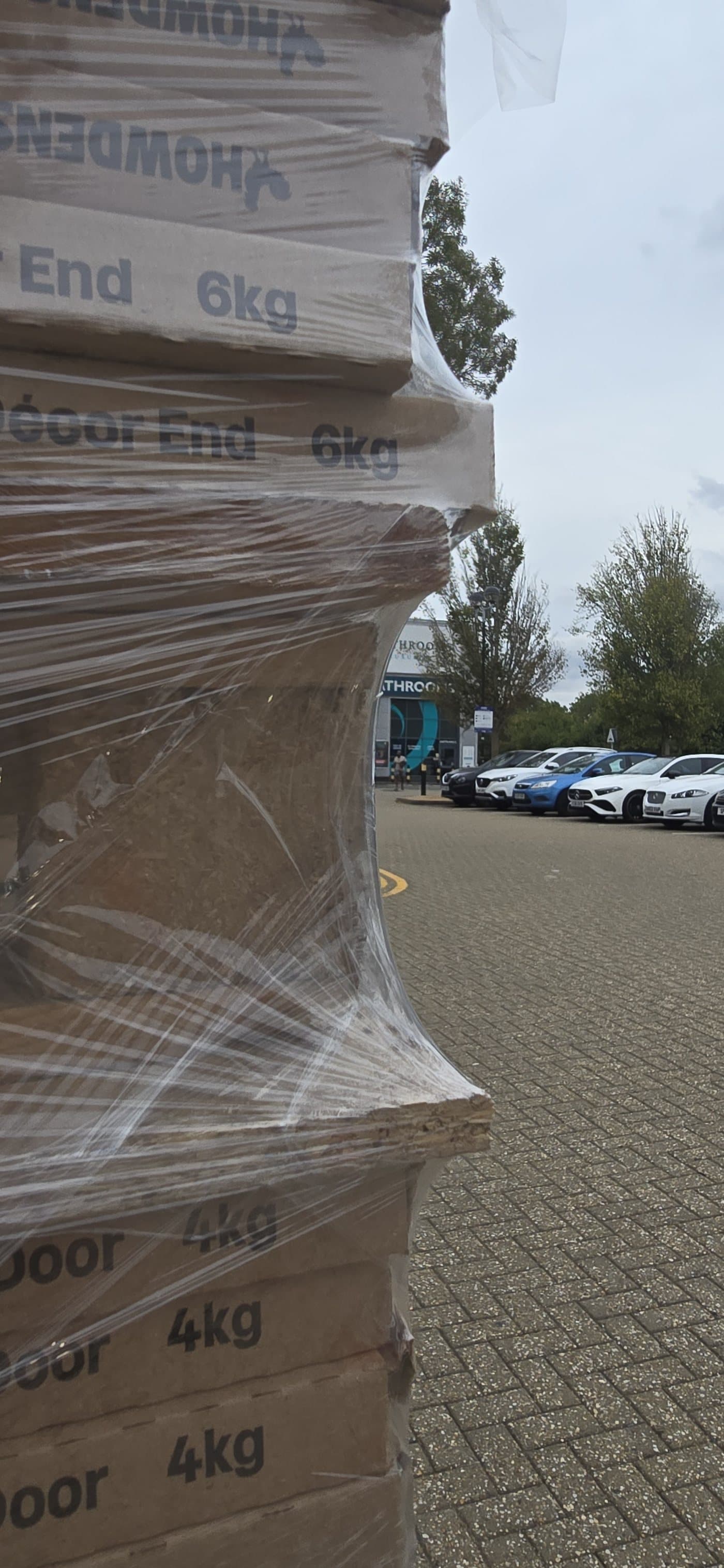 Hyper Wrap film drawn tight around the sharp corner of a stack of cartons without splitting